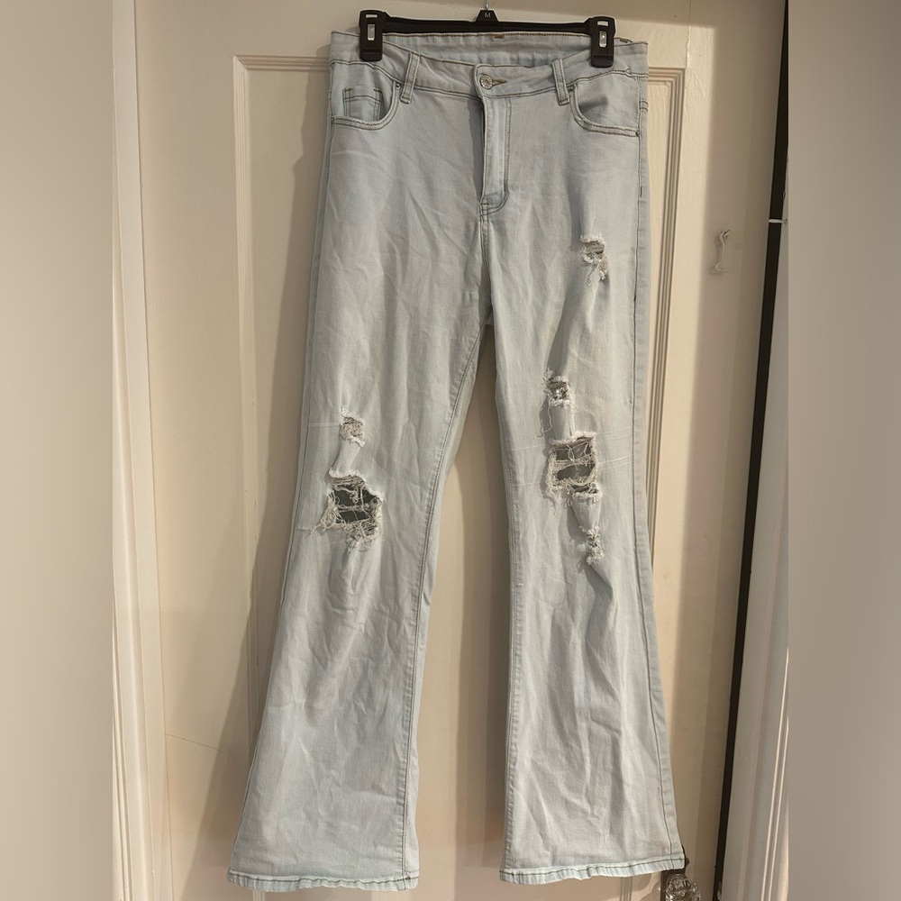 Cute distressed women’s flare jeans size large